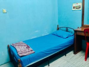 Postel nebo postele na pokoji v ubytování Greenleaf Guesthouse