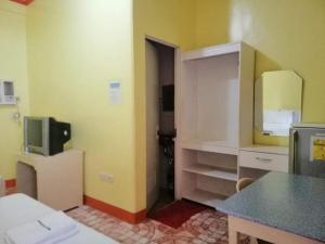 TV a/nebo společenská místnost v ubytování M&E Guesthouse