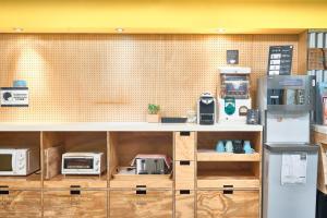 Kuchyň nebo kuchyňský kout v ubytování Bouti City Capsule Inn