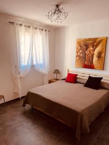En eller flere senge i et værelse på Fior di Macchia
