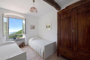 Postel nebo postele na pokoji v ubytování Cottage con vista mare