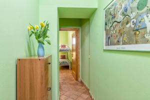 A bed or beds in a room at Dimora Teatro