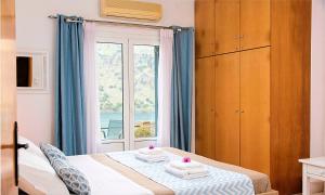 Postel nebo postele na pokoji v ubytování Du Lac Villas