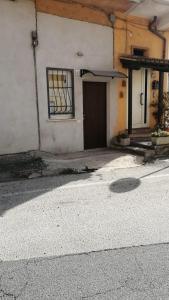 a building with a door on the side of it at Casa Valmontone in Valmontone