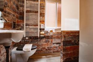 Kúpeľňa v ubytovaní Padre Boutique Hotel