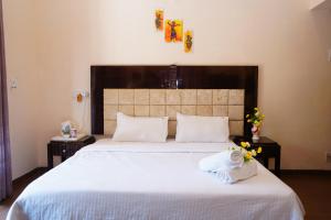 Ένα ή περισσότερα κρεβάτια σε δωμάτιο στο Bulverton Valley Villa