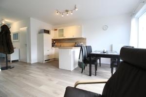 Kuchyň nebo kuchyňský kout v ubytování Kurparkcarree - Ferienwohnung Meeresbrise