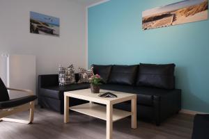 Posezení v ubytování Kurparkcarree - Ferienwohnung Meeresbrise