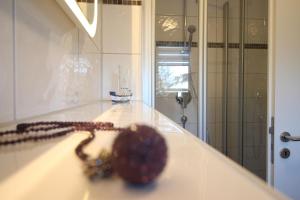 Koupelna v ubytování Kurparkcarree - Ferienwohnung Meeresbrise + 10 fotografií