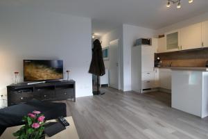 Kuchyň nebo kuchyňský kout v ubytování Kurparkcarree - Ferienwohnung Meeresbrise
