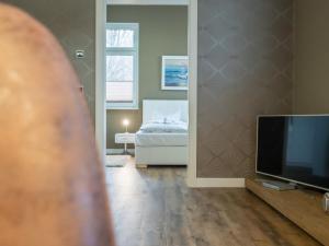 TV a/nebo společenská místnost v ubytování Sassnitz Villa Gössel, WE 3 RZV