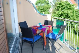 Balkón nebo terasa v ubytování Kurparkcarree - Ferienwohnung "Amber"