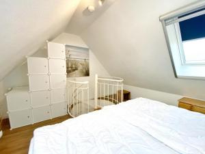 Katil atau katil-katil dalam bilik di Ferienwohnung "Lakeview" Am Neuensiener See