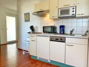Dapur atau dapur kecil di Hafenresidenz - Ferienwohnung 19 - Kapitän