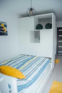 Postel nebo postele na pokoji v ubytování Rakoczi apartman 2