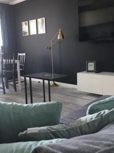 Posedenie v ubytovaní Apartament Miętowa Zebra