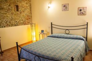 Ένα ή περισσότερα κρεβάτια σε δωμάτιο στο Room in Holiday house - Green Ortensia - Amazing apartment in Farmhouse