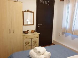 Cama o camas de una habitación en Margis Apartment