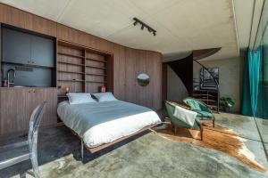 A bed or beds in a room at La Vista