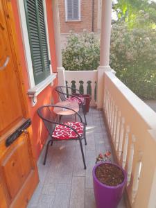 A balcony or terrace at Meuble' 21 di Anna
