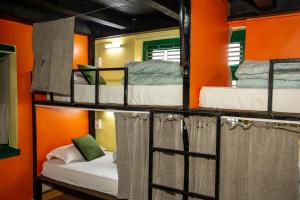 Postel nebo postele na pokoji v ubytování Trekkers Hostel