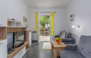 TV a/nebo společenská místnost v ubytování Apartment Majic