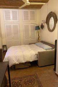 A bed or beds in a room at Tuscany Heba