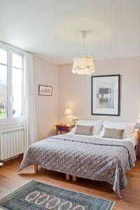 Katil atau katil-katil dalam bilik di Chambres d’hôtes la guirosse