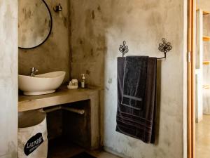 Vonios kambarys apgyvendinimo įstaigoje Guest Room at Joubert
