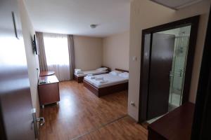 Postel nebo postele na pokoji v ubytování Restoran BSK + 15 fotografií