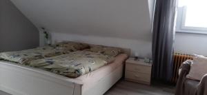 Postel nebo postele na pokoji v ubytování Ferienwohnung Gutowski