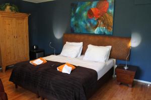Postel nebo postele na pokoji v ubytování Boutique Hotel Nieuw Beusink