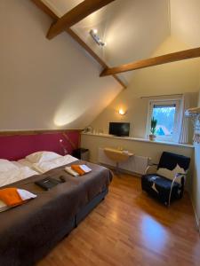 Postel nebo postele na pokoji v ubytování Boutique Hotel Nieuw Beusink