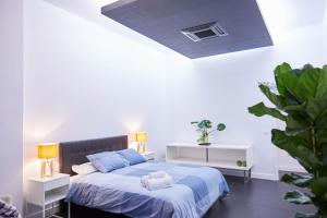 Tempat tidur dalam kamar di LOFT PRINCIPE PIO