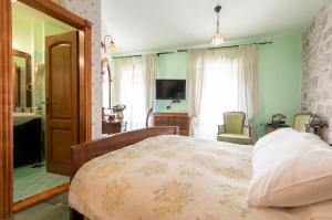 Katil atau katil-katil dalam bilik di Hotel Monte Cristo