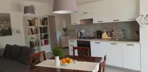 A kitchen or kitchenette at La Colombera Még 29 kép