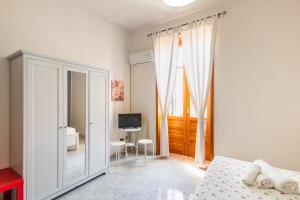 Una cama o camas en una habitación de Casa Mia