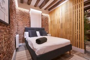 Ένα ή περισσότερα κρεβάτια σε δωμάτιο στο Plaza Chueca Apartment