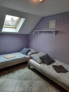 Letto o letti in una camera di Statek u kapličky