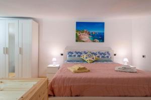 Posteľ alebo postele v izbe v ubytovaní Casa Vacanza Francesca