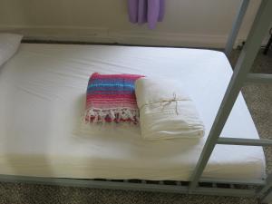 Postel nebo postele na pokoji v ubytování Pahoa Village Hostel