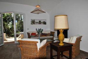 Posezení v ubytování VILLA CORBEZZOLO tra natura e mare + 28 fotografií