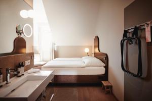 Postel nebo postele na pokoji v ubytování Boutique Hotel das Salz