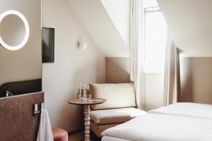 Postel nebo postele na pokoji v ubytování Boutique Hotel das Salz