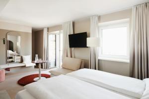 TV a/nebo společenská místnost v ubytování Boutique Hotel das Salz