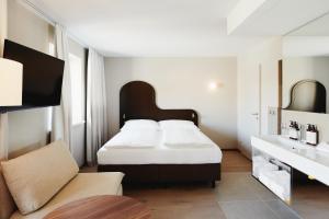 Postel nebo postele na pokoji v ubytování Boutique Hotel das Salz