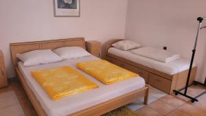 Postel nebo postele na pokoji v ubytování HOSTEL "ARCO"