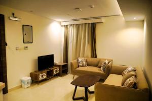 TV a/nebo společenská místnost v ubytování فضة تالا للشقق المخدومة 2