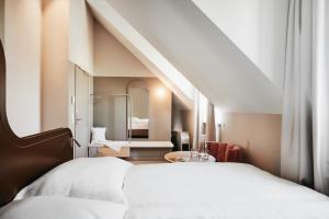 Postel nebo postele na pokoji v ubytování Boutique Hotel das Salz