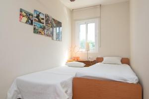 Postel nebo postele na pokoji v ubytování Ca Minorica -Apartamento-